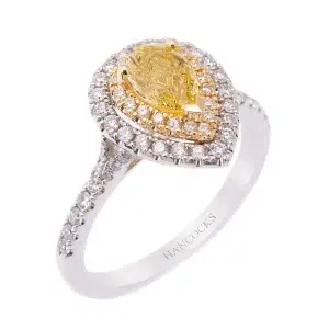 Platinum Pear Cut Yellow Halo Diamond Ring