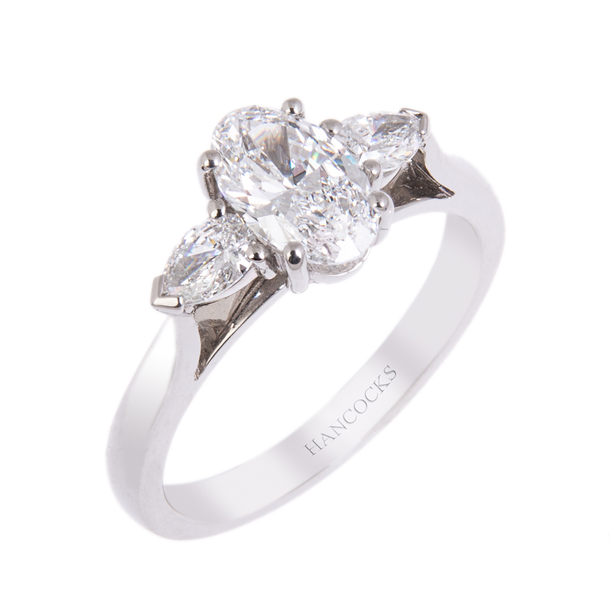 oval diamond three stone engagement ring