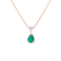 pear cut emerald and diamond pendant