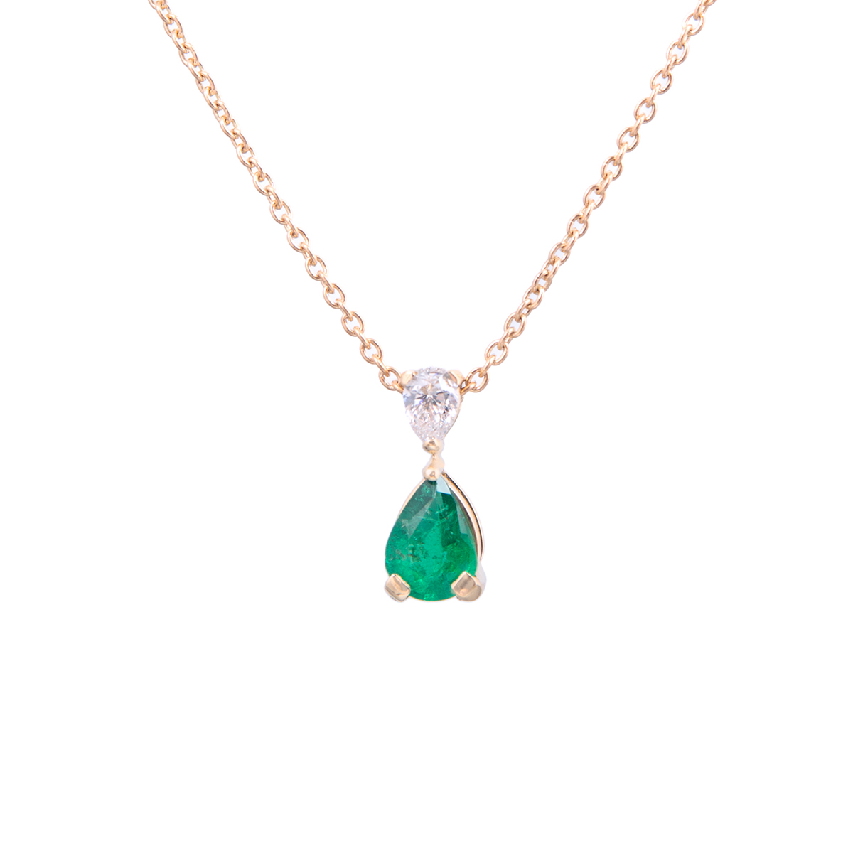 pear cut emerald and diamond pendant