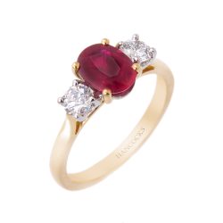 Oval Ruby and Brilliant Cut Diamond 3-Stone Ring