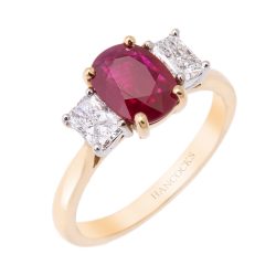 Gold Oval Ruby and Diamond 3-Stone Ring