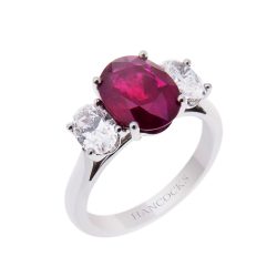Oval Ruby and Diamond Three Stone Ring