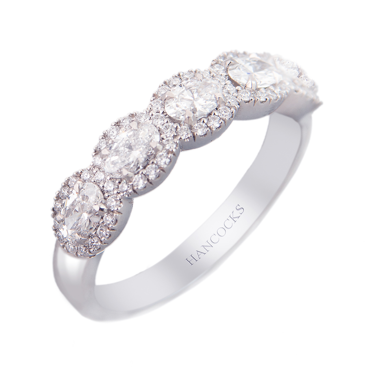 oval halo set diamond eternity ring in platinum