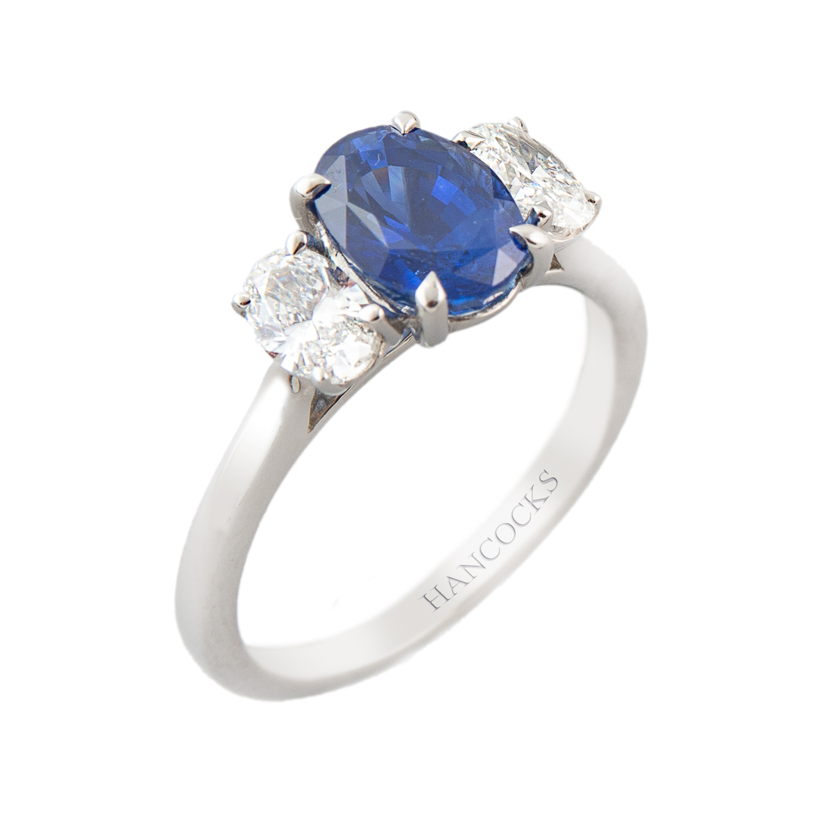 all oval sapphire and diamond ring in platinum