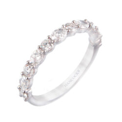 platinum oval and brilliant cut diamond set wedding ring
