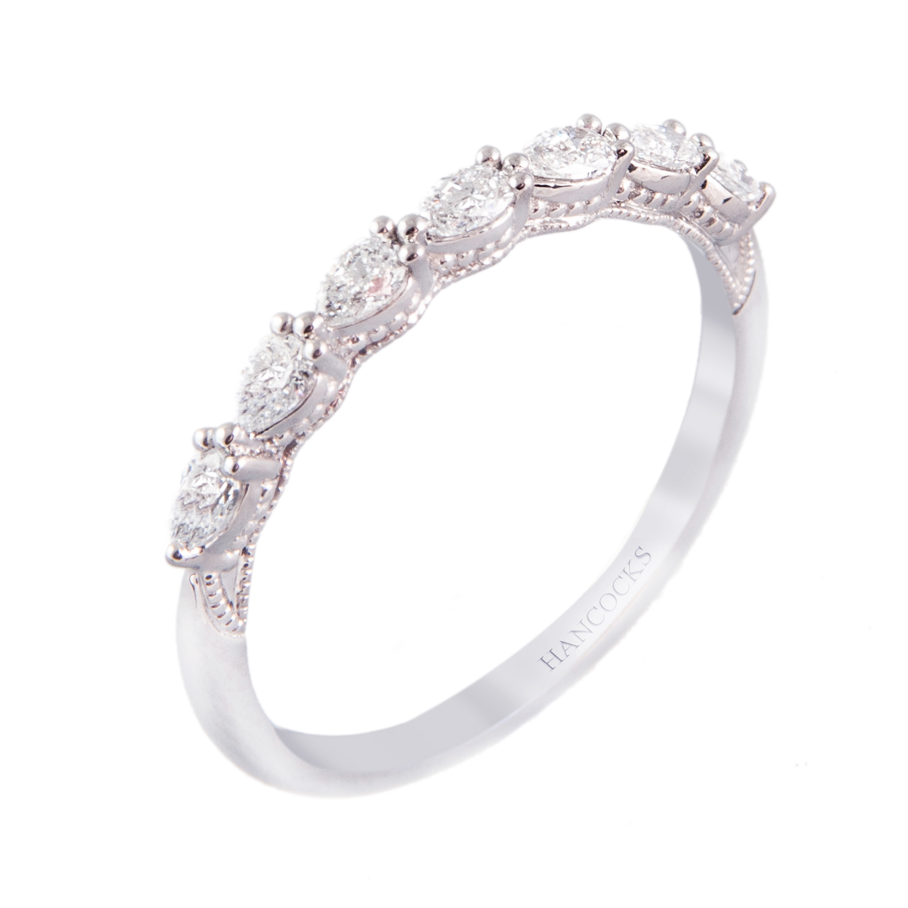 platinum pear cut diamond wedding ring
