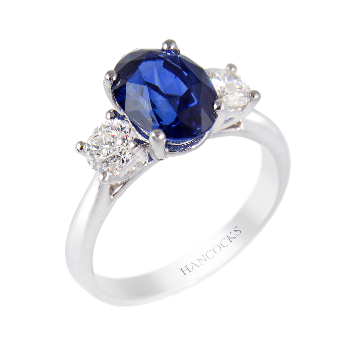 oval sapphire and diamond ring in platinum