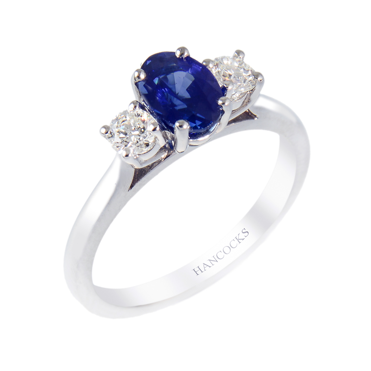 oval sapphire and diamond three stone ring