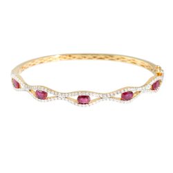 ruby and diamond bangle in yellow gold