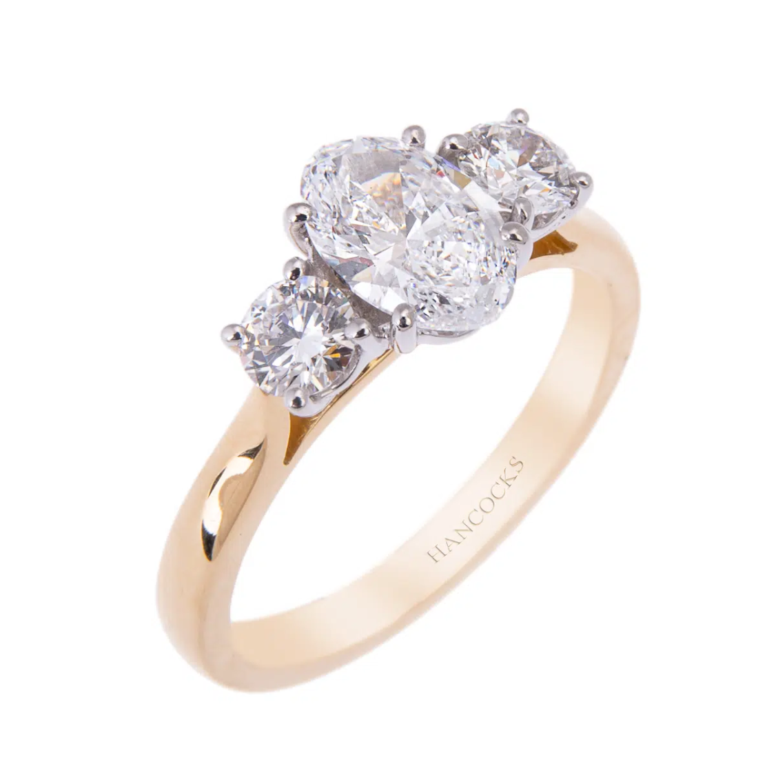 Oval Cut Diamond 3-Stone in Yellow Gold