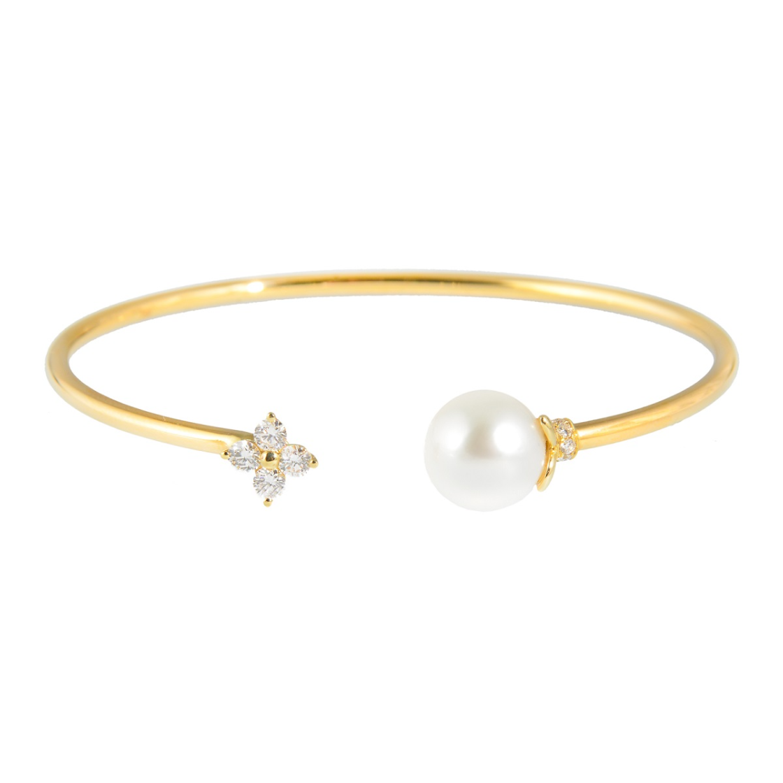yellow gold bangle with a pearl and diamond crafted on each end