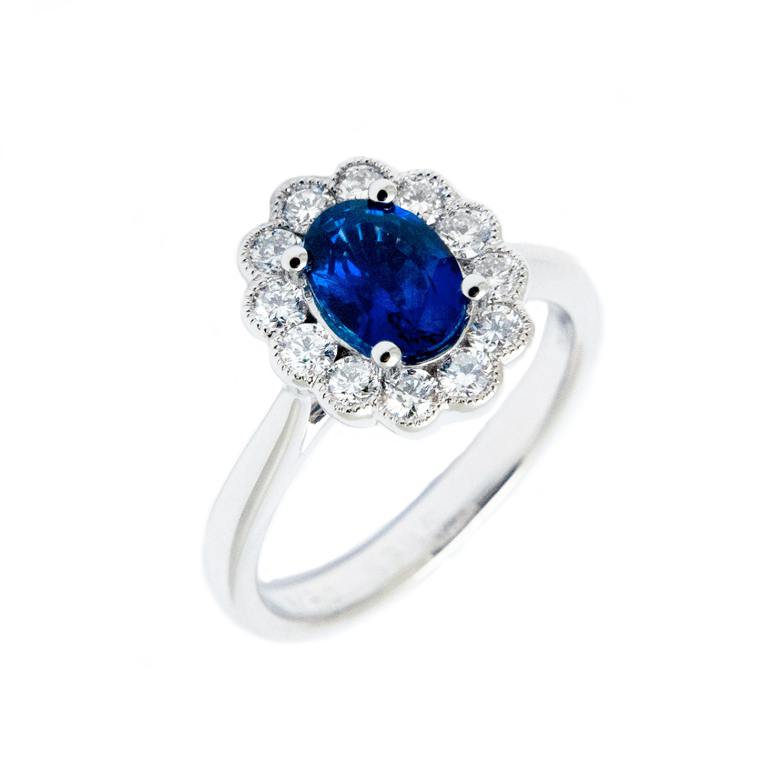 Oval Sapphire and Diamond Cluster Ring