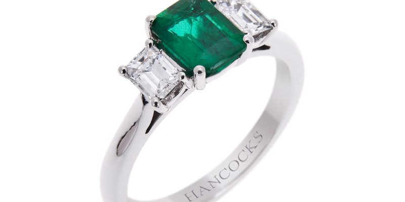 Emerald cut diamond and emerald ring