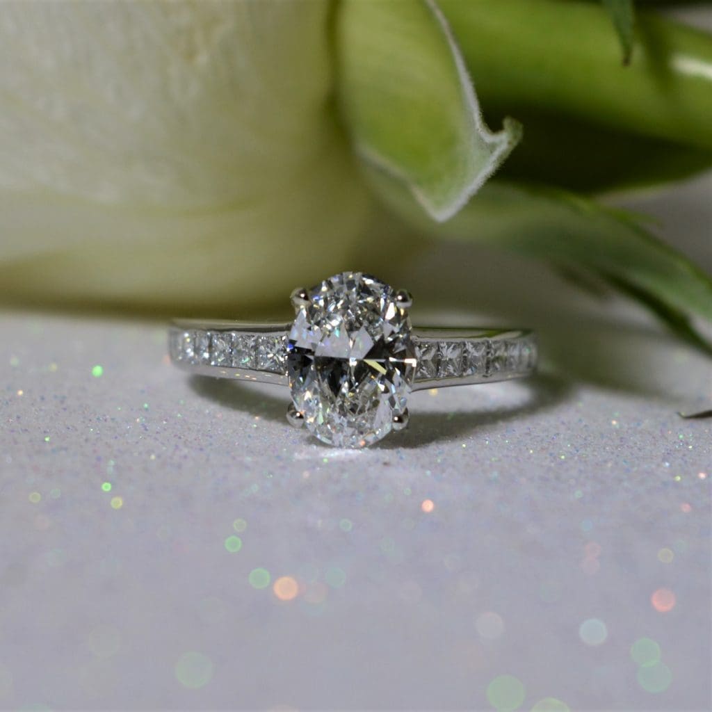 certificated-oval-cut-diamond-engaement-ring-with-diamond-shoulders